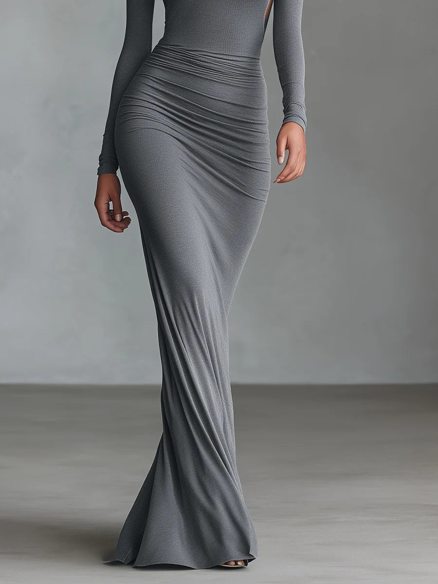 Vestido largo gris de punto elástico con espalda abierta