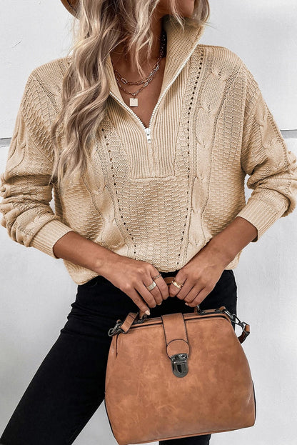 Jersey trenzado con cremallera y cuello alto