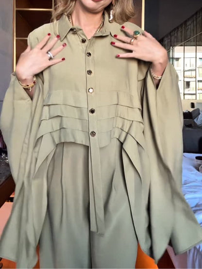 Conjunto de camisa extralarga con mangas murciélago y pantalones anchos