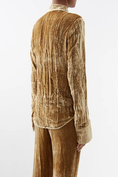 Blusa elegante de textura lisa