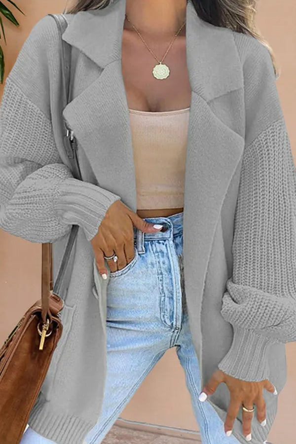 Chaqueta de punto con solapa tipo traje y detalle de mezcla en lana