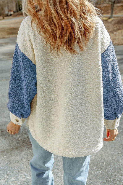 Abrigo de pelo bicolor con bolsillos y solapa