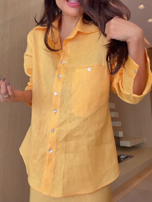 Conjunto amarillo cálido de camisa y falda larga